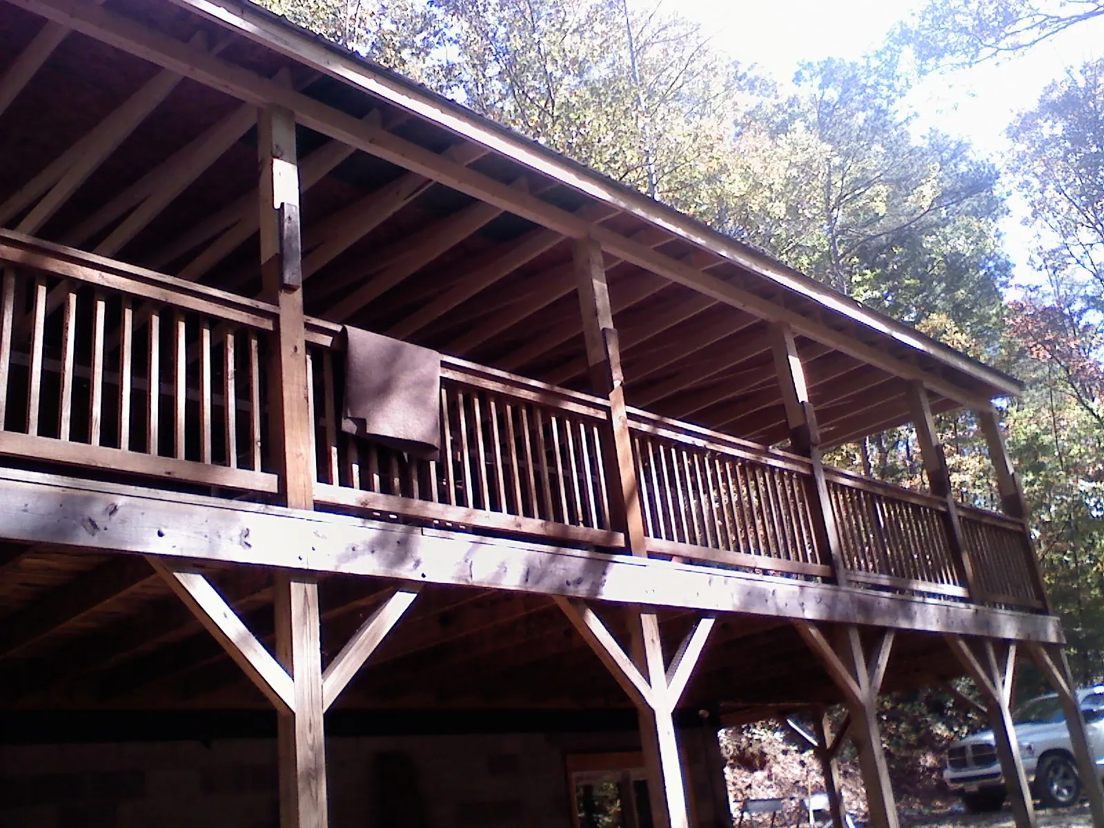 Timber framing under a new elevated porch and deck — Roof Leak Repair in Wade by Roofing Brothers